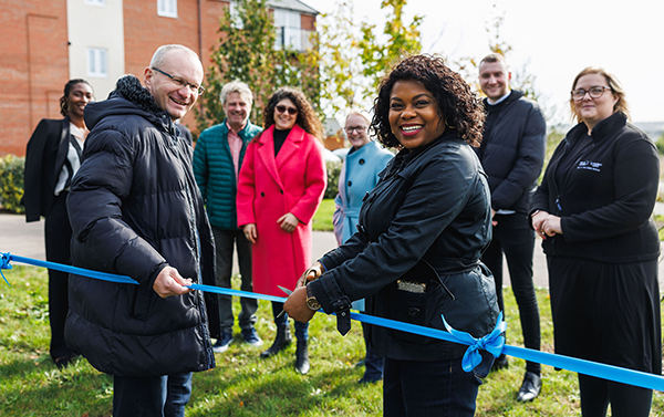 Stonewater's Graham Walker and Olubukola Opawumi cutting the ribbon to open the scheme in New Cardington